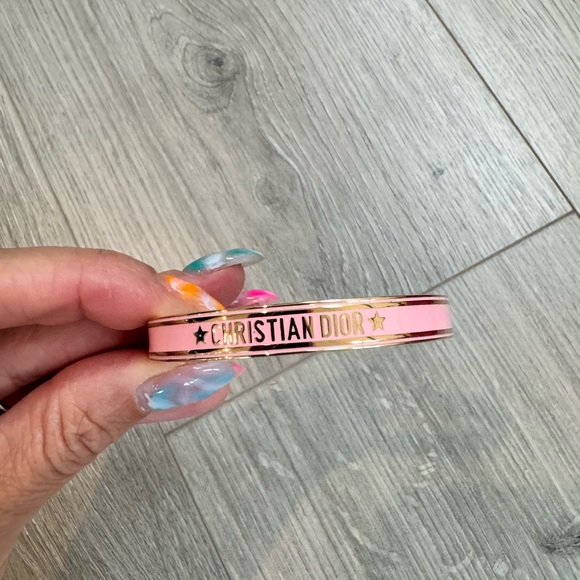 Christian Dior code bangle in pink; worn once; first a size small wrist - Picture 1 of 4